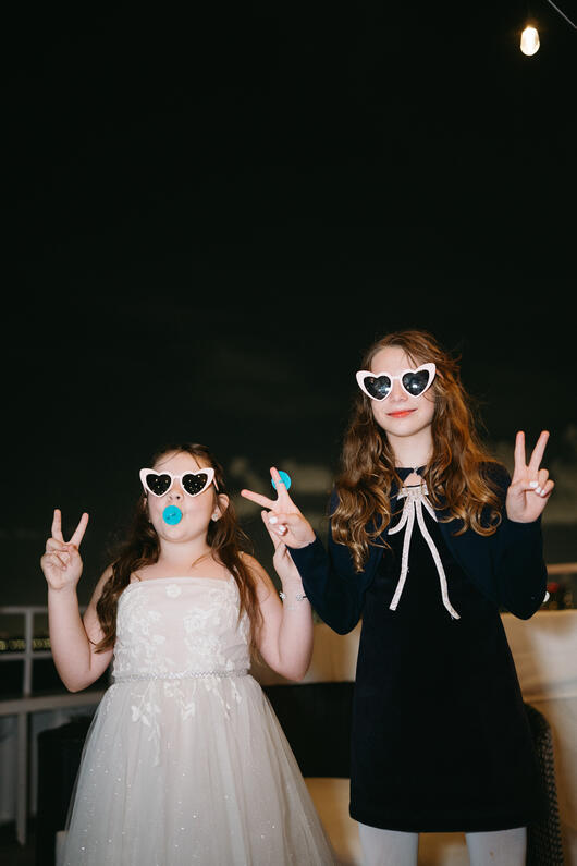 Coolest kids in Miami at a wedding on a boat.