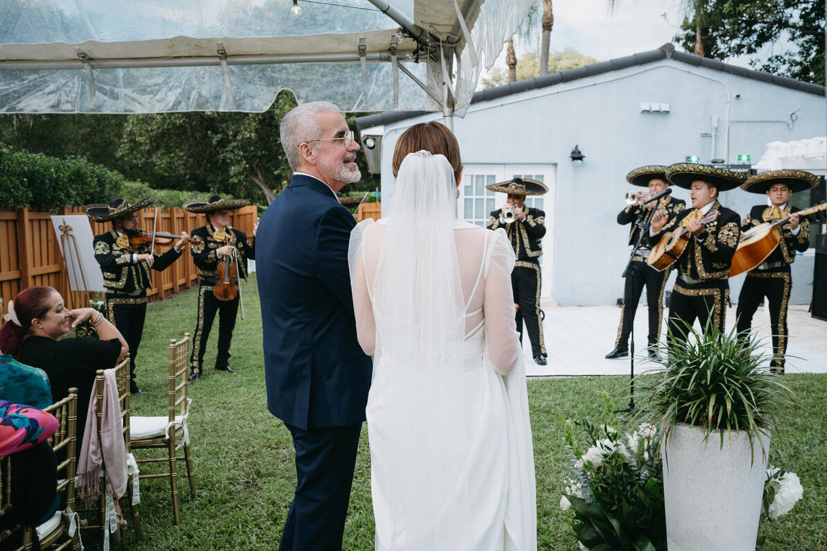 A backyard celebration in Coral Gables with the bride &amp; groom, traditional mariachi, and their closest friends and family.